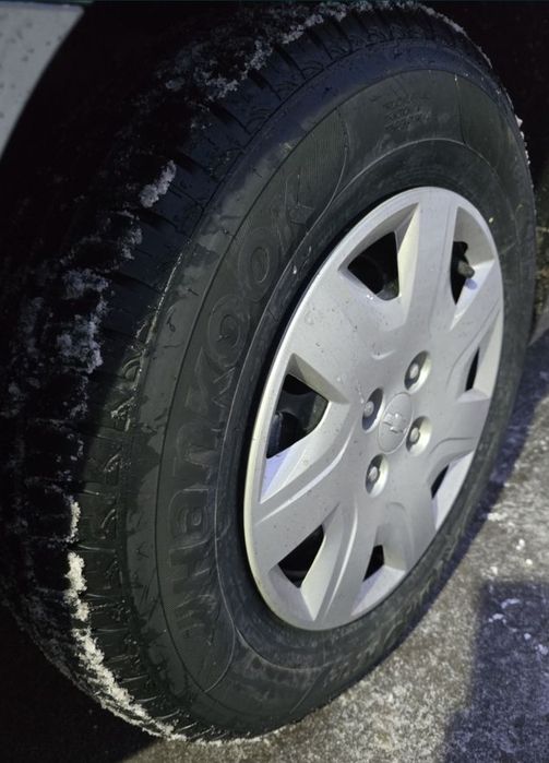 Продам резину с дисками и колпаками
