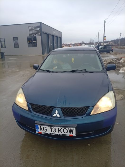 vând mitsubisi lancer