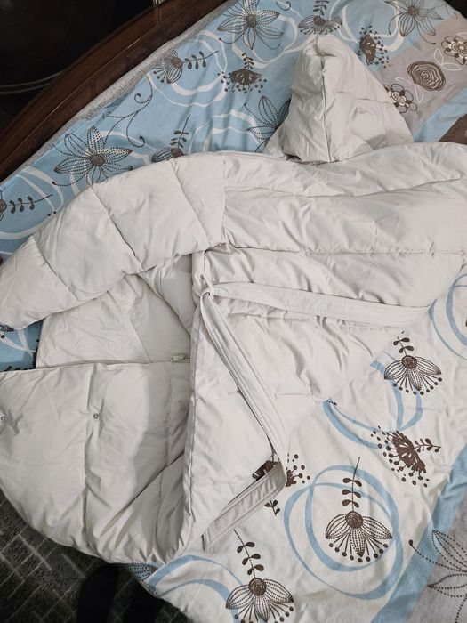 Продам пуховик новый