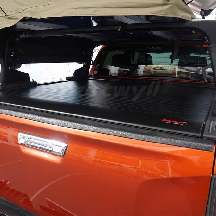 Ролета крышка кузова ISUZU D-MAX  ручная и электрическая.