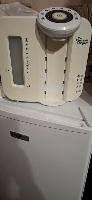 Машина за приготвяне.на адаптирано мляко Томи Тип