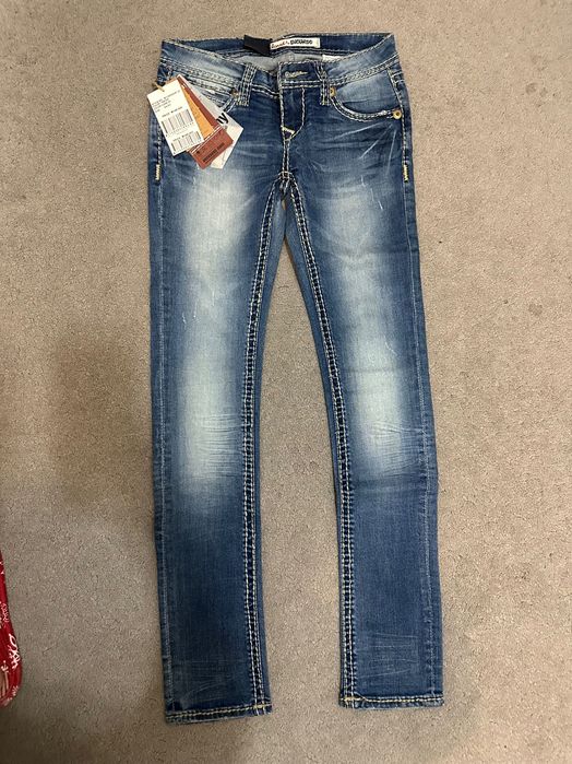 Джинсы слим женские