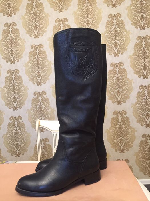 Продам новые сапоги