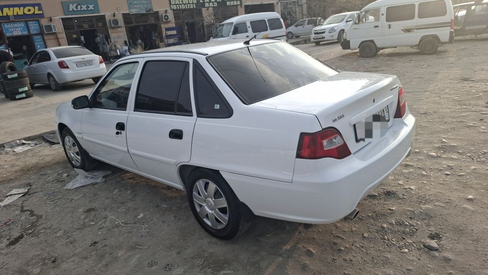 Нексия 2 топ тоза.50 минг юрди. супер канденсанер.