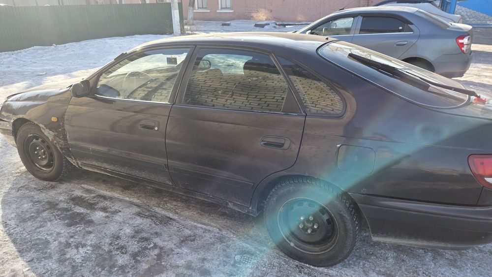 Продам тойоту карина е