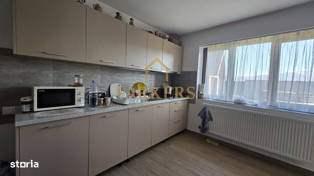 Casă renovată 150 mp utili + 1000 mp teren, priveliște spre Munte