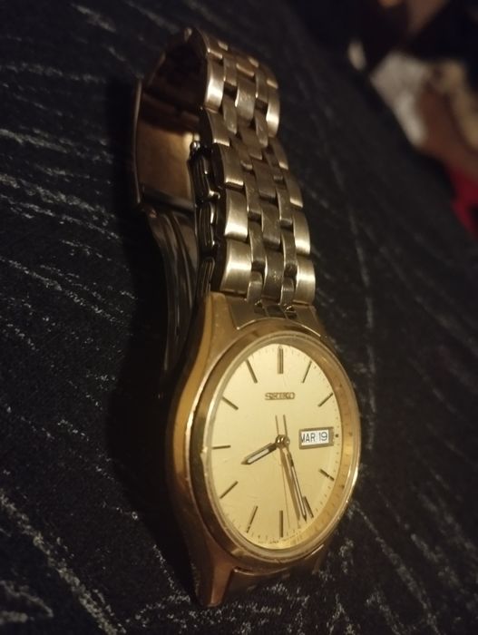 Ceas,SEIKO,aurit,galben suflat.(coart))