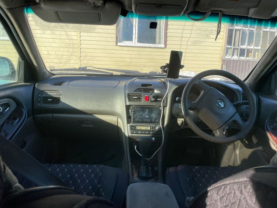 Ниссан сеферо А33