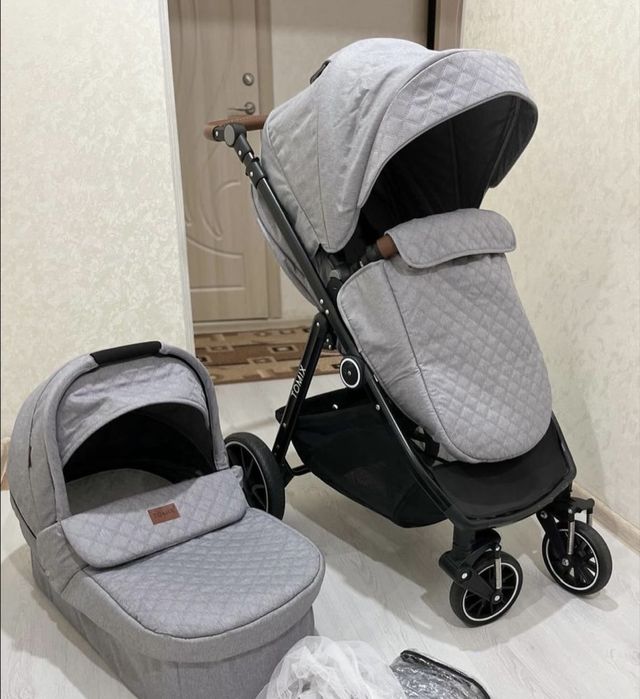 Продам коляску Tomix Aura
