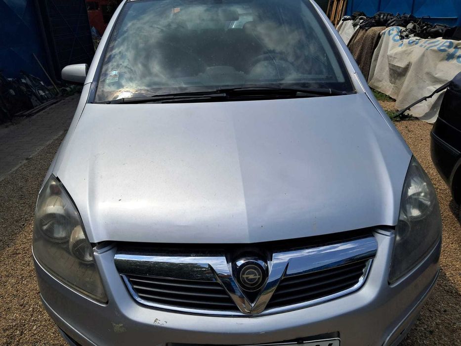Opel Zafira B, capota motor, grila fata, far stanga complet