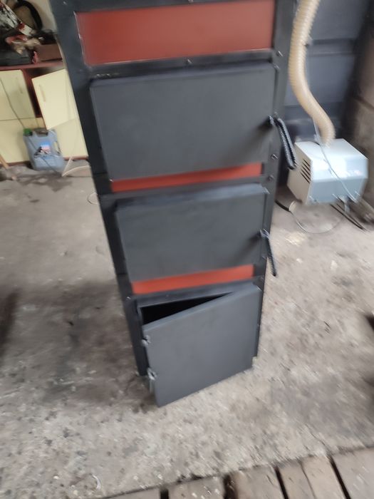 Комбиниран котел  за дърва и пелети