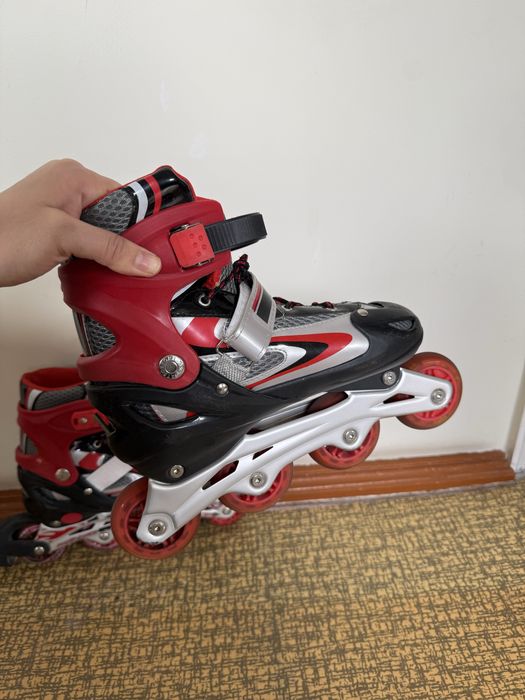 Роликовые коньки