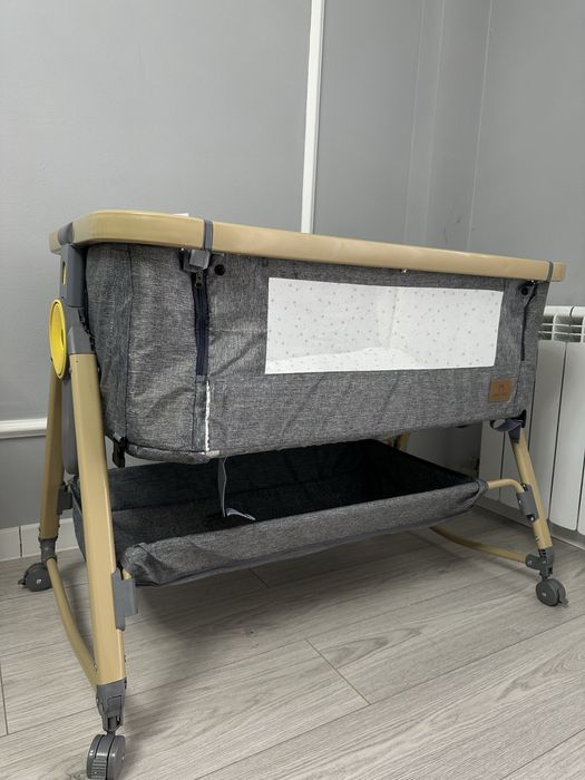 Продам приставную кроватку