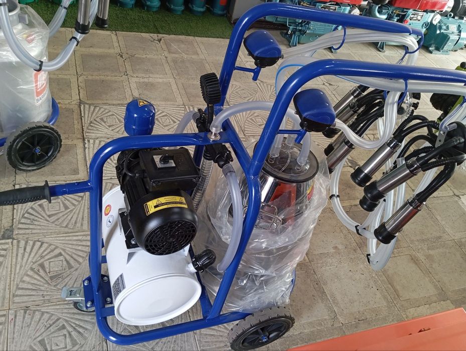 Сут согадиган. Доилный аппарат. Сигир согадиган.