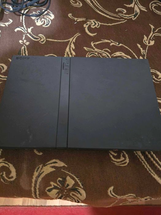 PlayStation 2 с добълнителен контролер + 3 видео игри + 2 микрофона