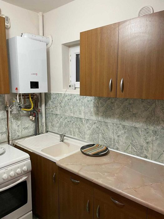 Dau în chirie garsoniera 30 mp