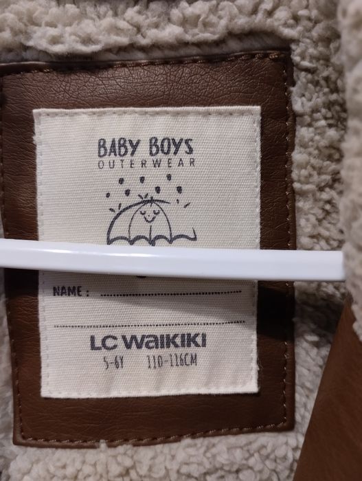 Куртка 2000 тенге