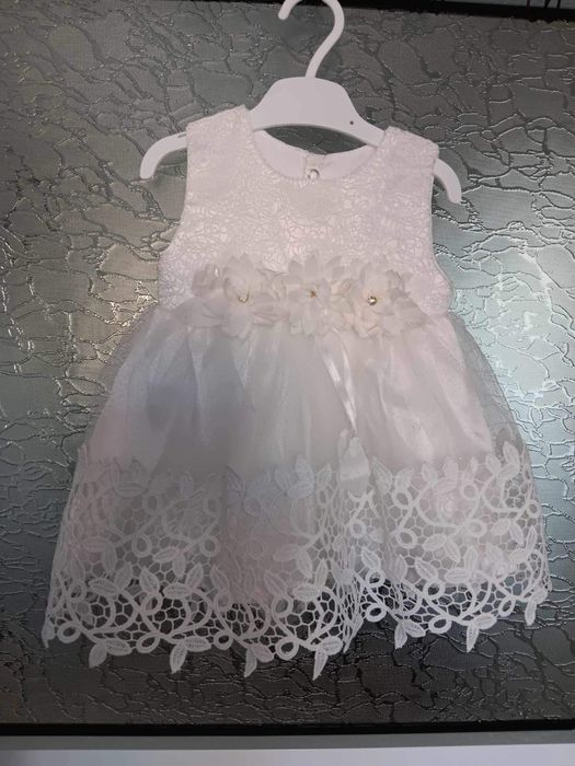 Дрехи за новородено нови