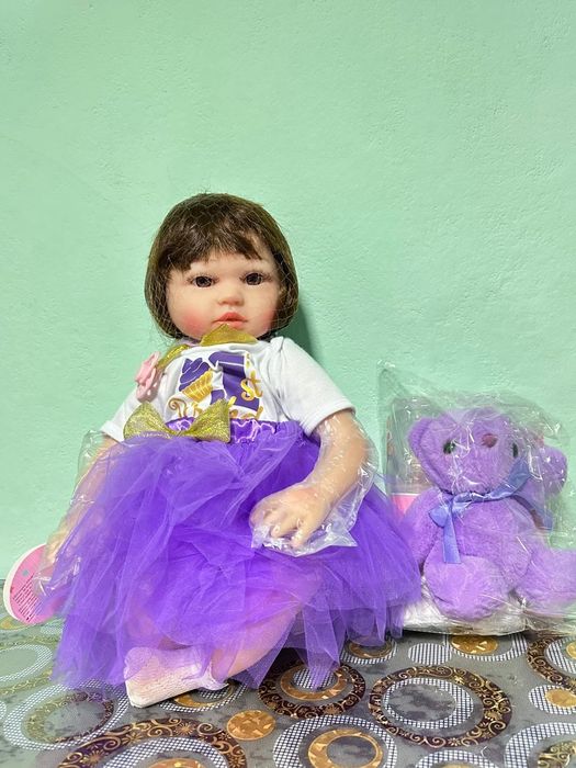 Păpușa realistică