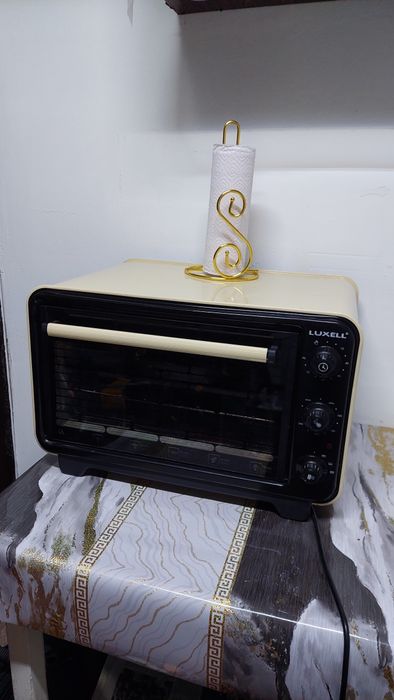 Продам Духовой шкаф Luxell.