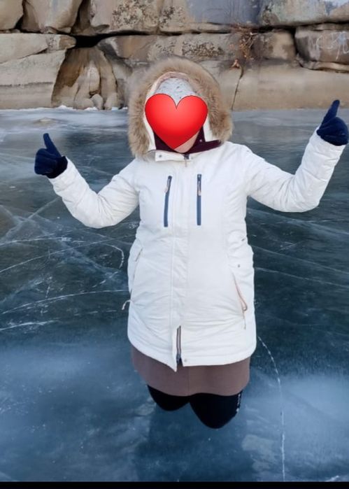 Продам пуховик женский зима