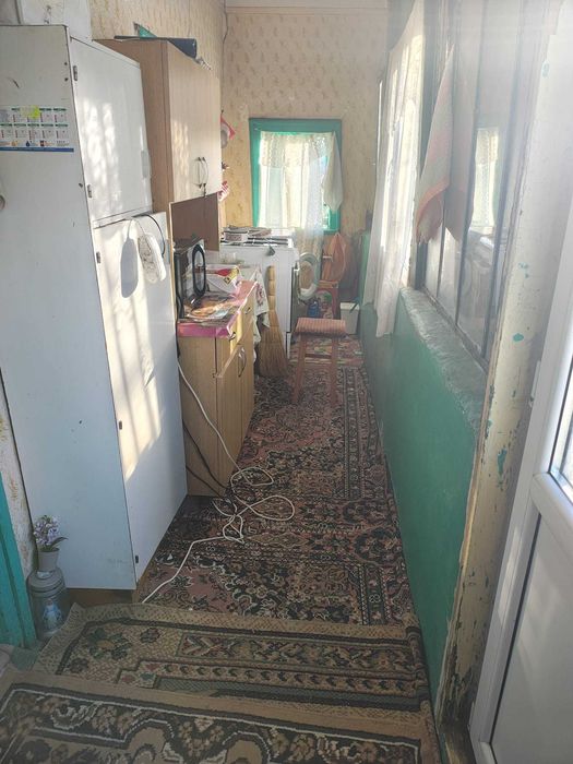 Casă cu teren 1.100 mp de vânzare – Tichilești | Preț negociabil