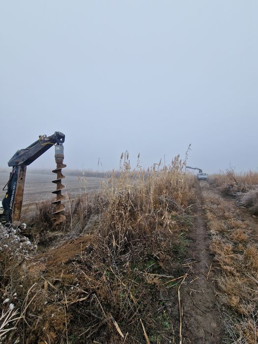 Услуга ямобур трактор три в один