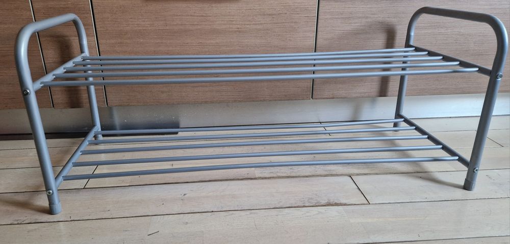 Намалявам Поставка за обувки