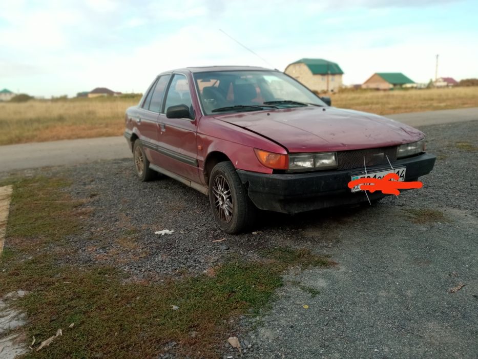 Продам Митсубиси Лансер