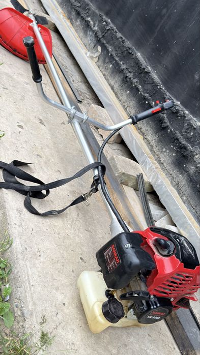 Новая косилка бензиновая