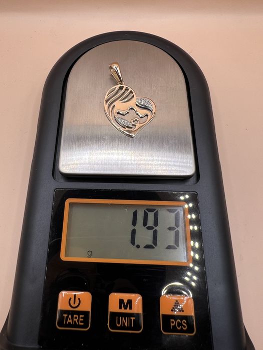 Продам золотой кулон.