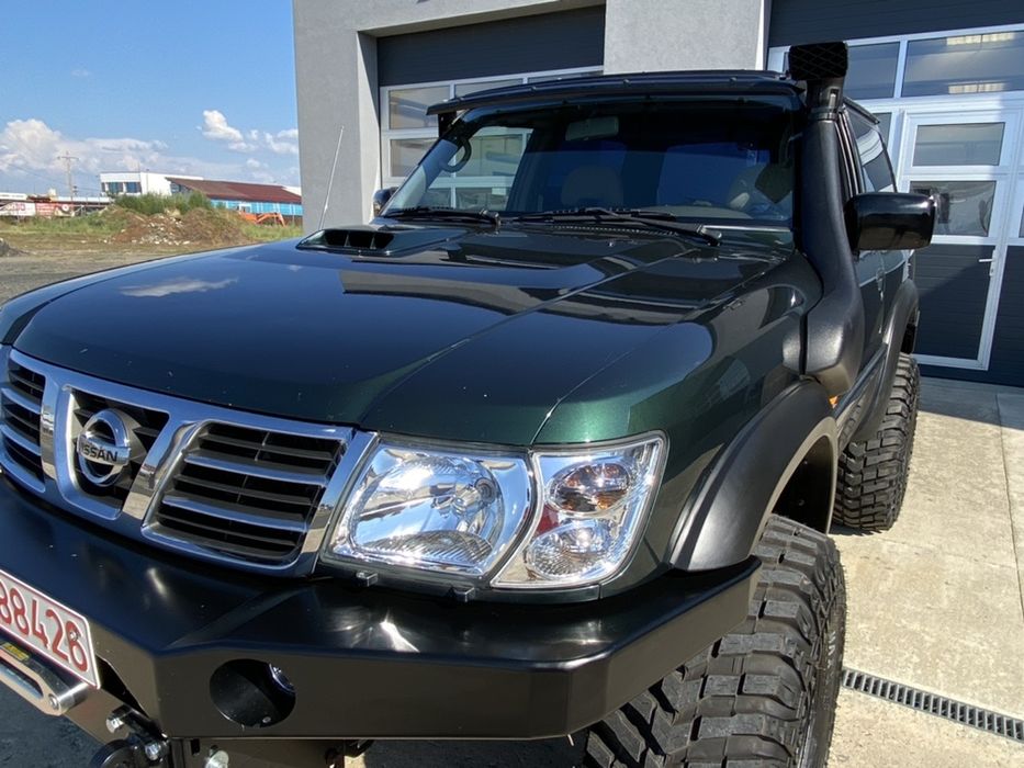 Bara fata Nissan Patrol Y61 cu suport de troliu