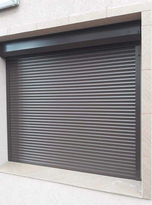 RULOURI Aluminiu si Usi de garaj rezidentiale SECTIONALE