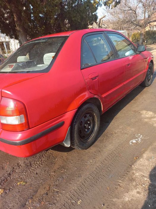 Мазда 323 90 к.с