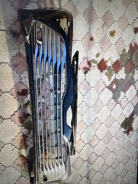 Бампер с решеткой на камри 70