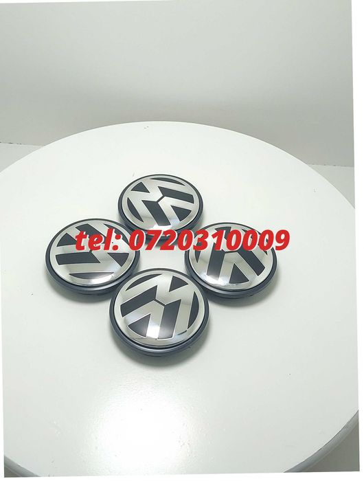 Capace Jante Aliaj Volkswagen / 65Mm / Ansamblu 4 Buc / Cod 3B7601171 Originale Pentru Inlocuire Reparatie Sau Completare Echipament Compatibile