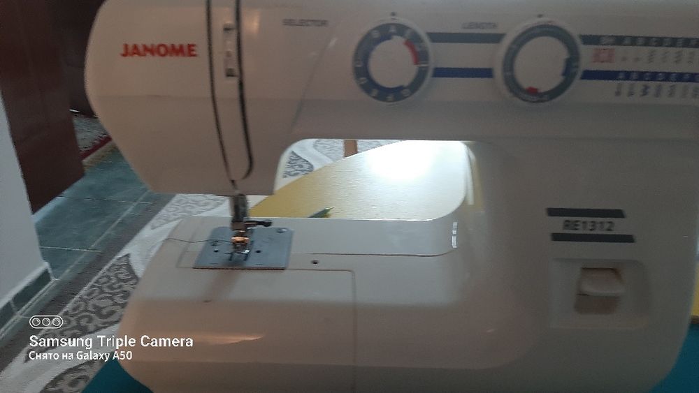 Швейная машина janome