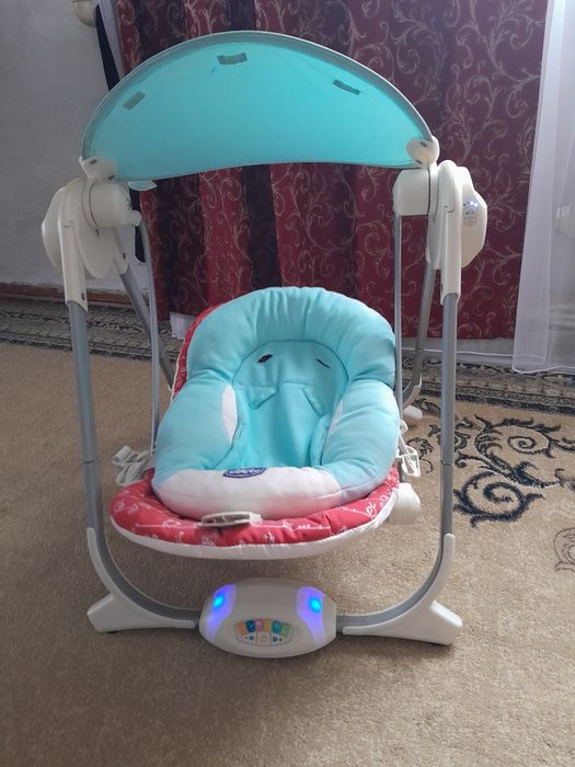 Продам качелю от Сhicco