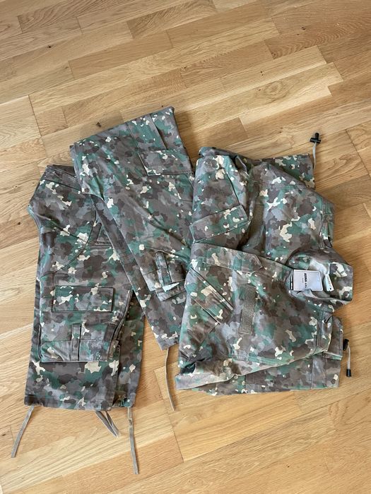 Costum combat nou