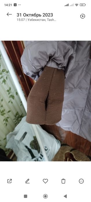 Куртка женская на пуху с енотовым воротником