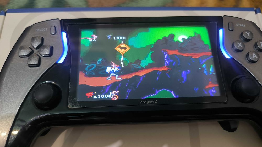 Продам портативную консоль Project X.