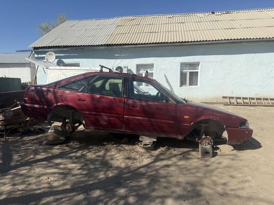 Легковые автомобили Мазда 626