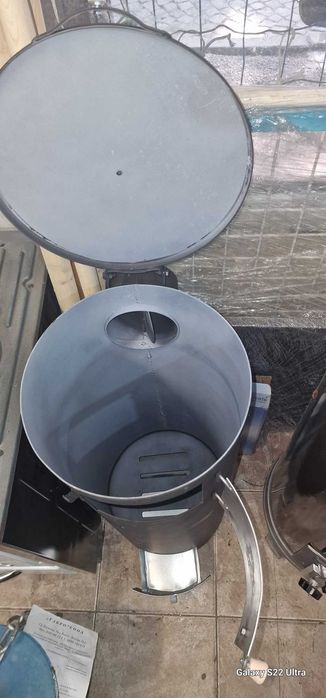 Отоплителна печка без кофа твърдо гориво