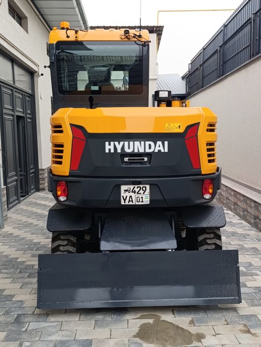 Экскаватор хизмати