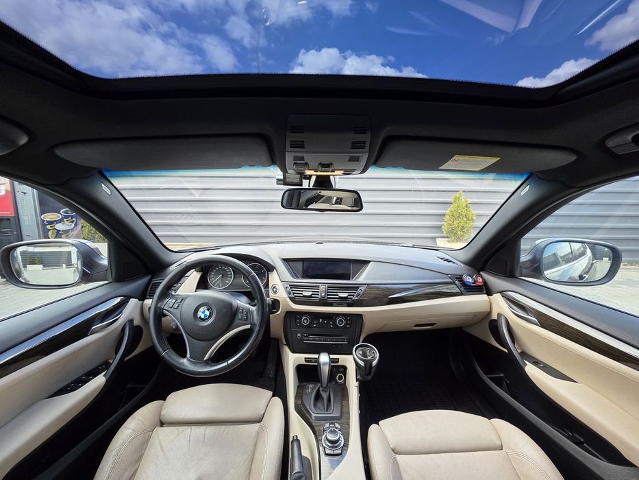 BMW X1 An fabricație 2011 motorizare 2.0 diesel Bi-Turbo de 204 CP, tracțiune integrală xDrive (4x4), cutie automată, pachet X-Line
