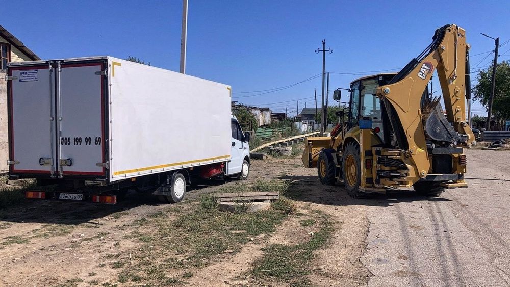 Услуги экскаватора-погрузчика