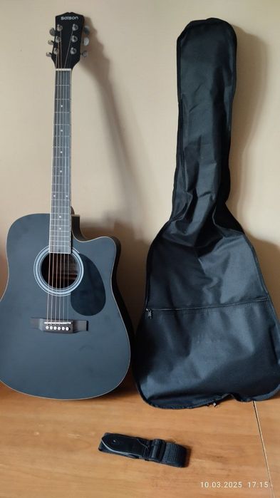 Acustik gitara holati yangi