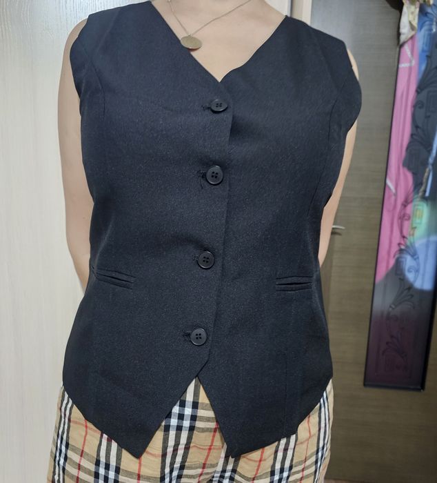 Продам женский жилет