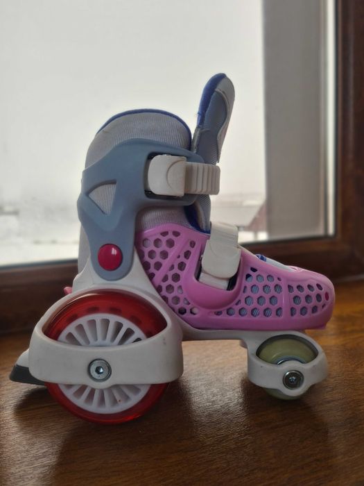 Роликовые коньки