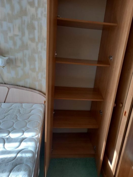 Шкаф угловой плательный